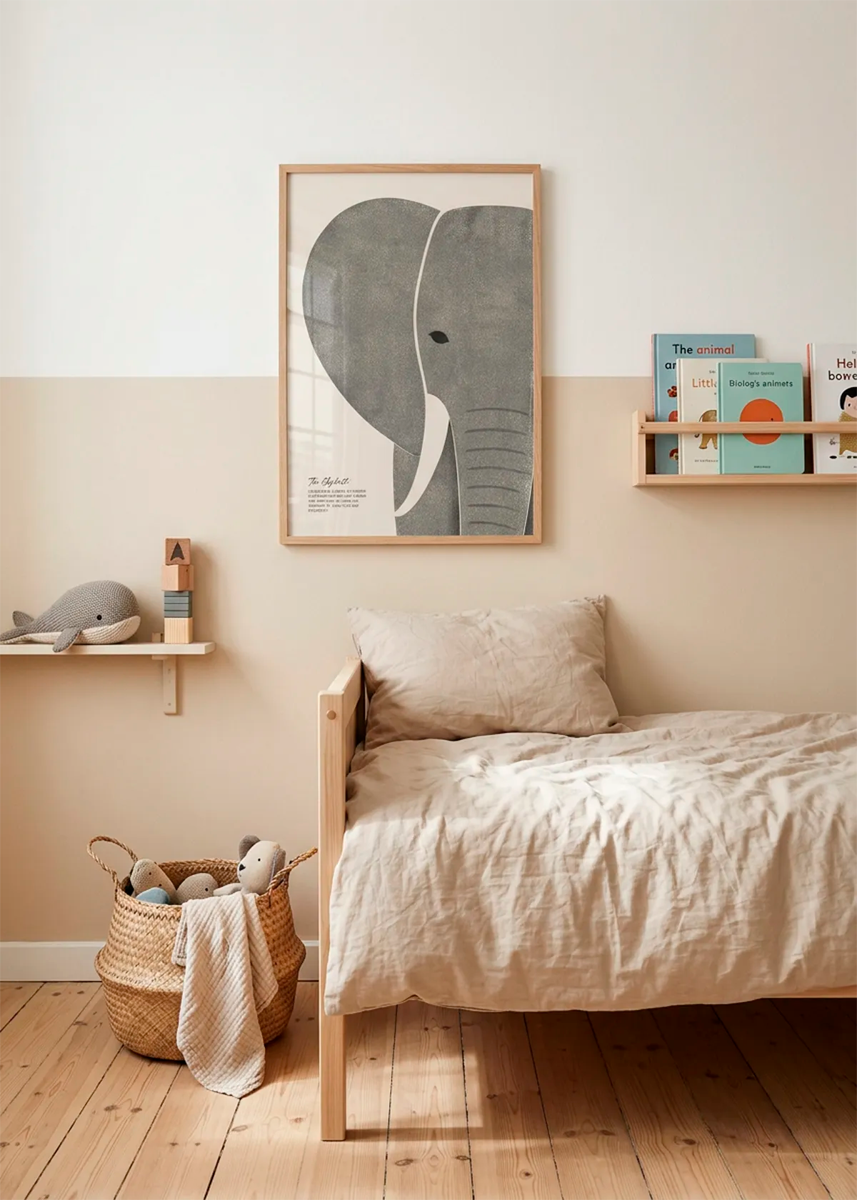 Textured Elephant Wisdom art poster by Ohkimiko displayed above a child’s bed in a soft neutral room with beige bedding, wooden furniture, books and woven storage.