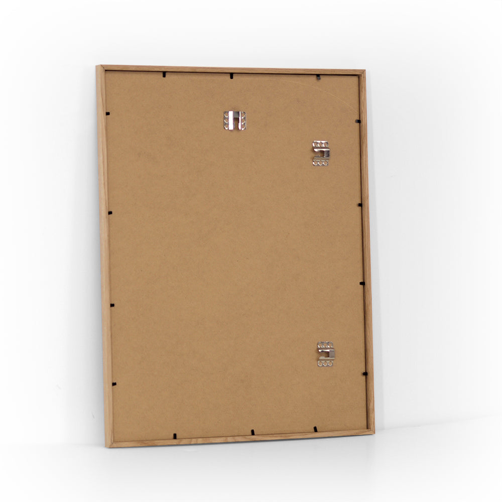 Back view of natural oak frame 40x50 cm with MDF backing and metal hangers – ready to hang.
