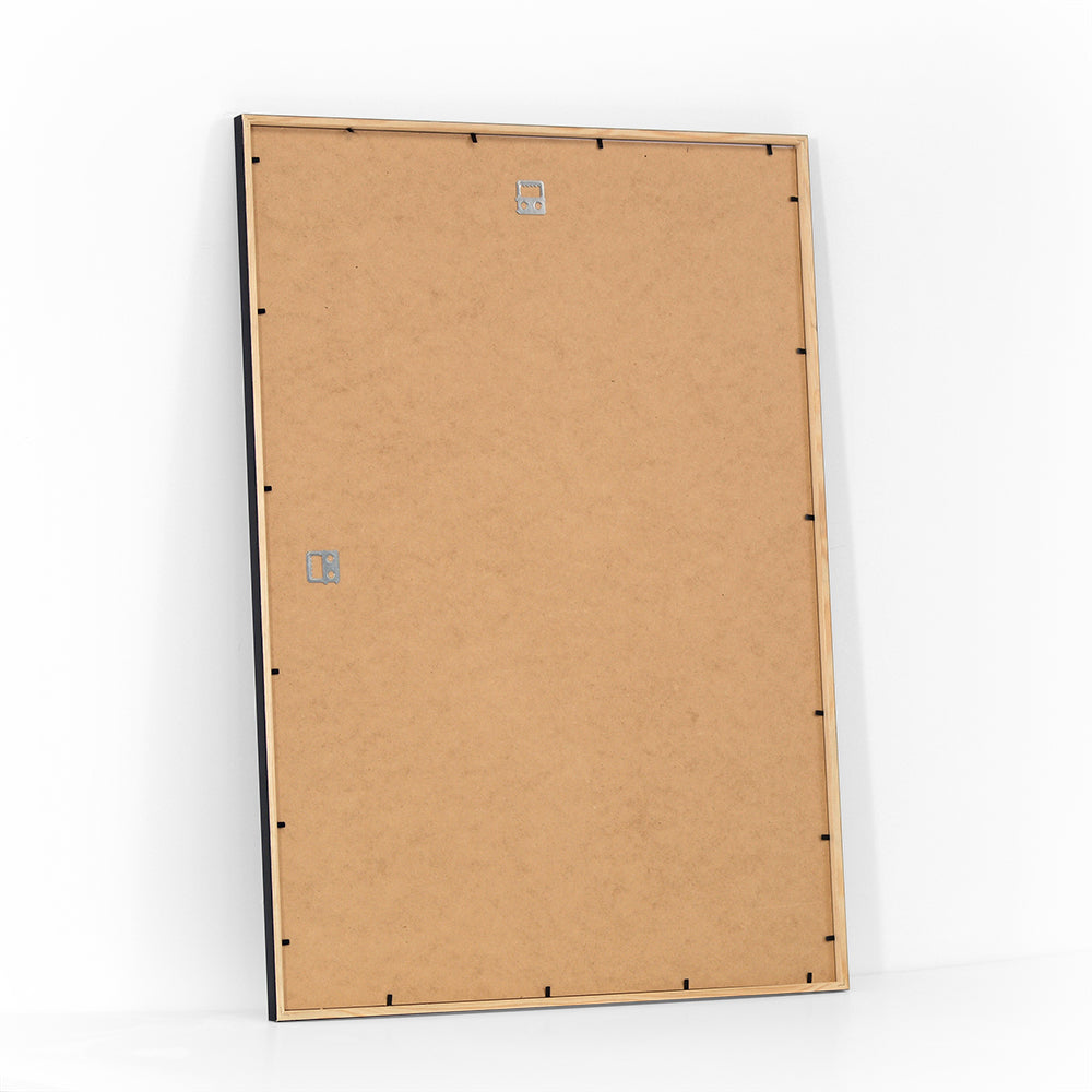 Back of a black wooden frame, size 50x70 cm, with wall mounting hardware.