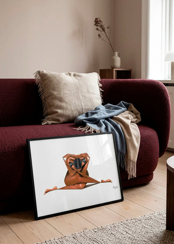 Abstract Geometric Splits by Manasseh Johnson Sr. – framed figurative art poster featuring a woman in a full side split with black geometric details, styled in front of a deep burgundy sofa in a warm neutral living room.