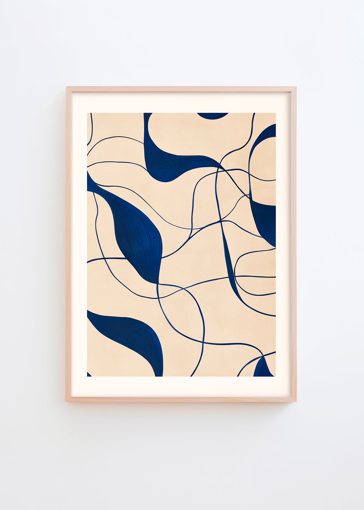 A minimalist poster titled "Art" with navy blue abstract curves on a beige background, displayed in a natural wood frame against a white wall.