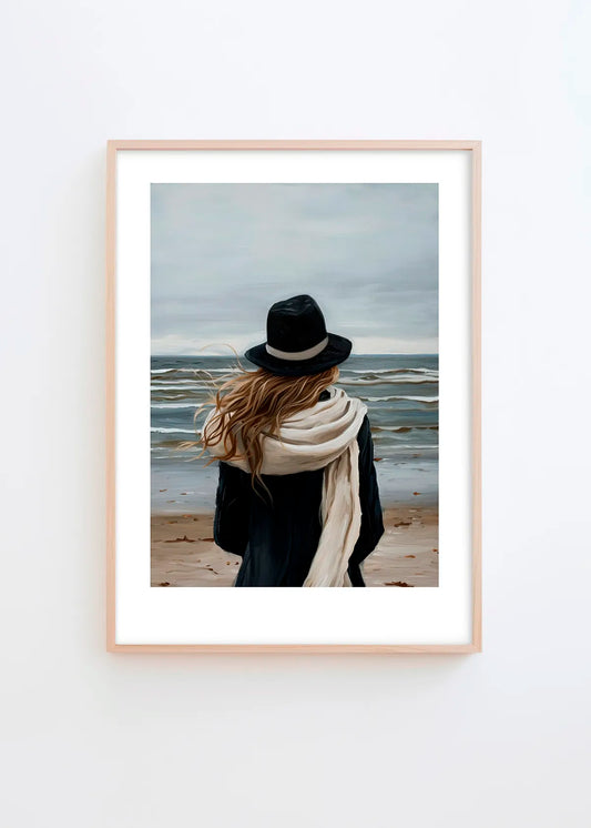 A Walk By The Sea poster in a minimalist Scandinavian interior with light grey wall and natural wood frame, featuring calm blue, beige and soft neutral coastal tones.