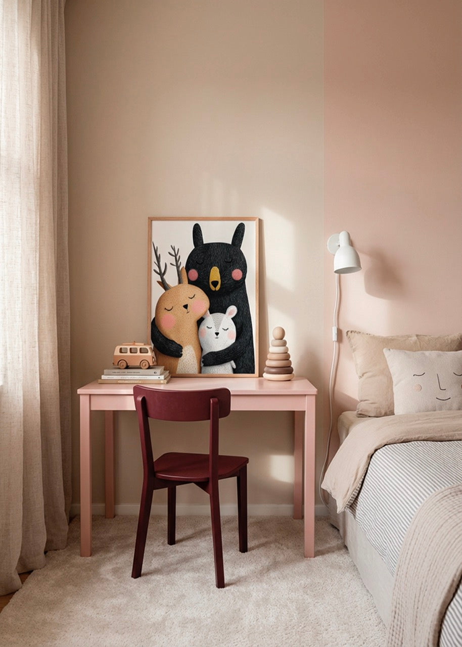 BFF children’s poster with a black bear hugging two forest friends, styled above a pink desk in a soft beige kids bedroom.