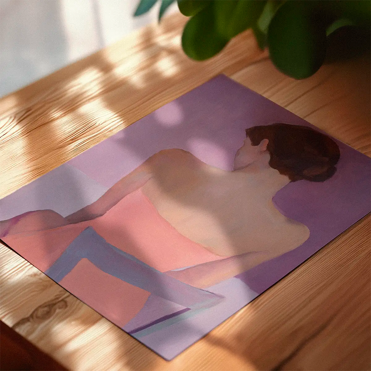 Ballroom poster featuring an elegant woman in a pink dress, lying flat on a wooden table in warm natural light.