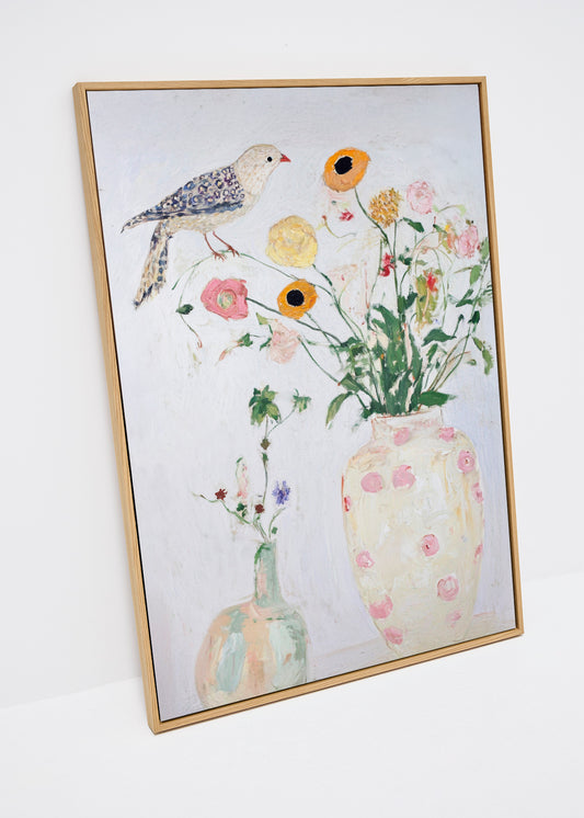 Bird no. 1 canvas print featuring a painted bird and pastel flowers on a white background in a light oak frame