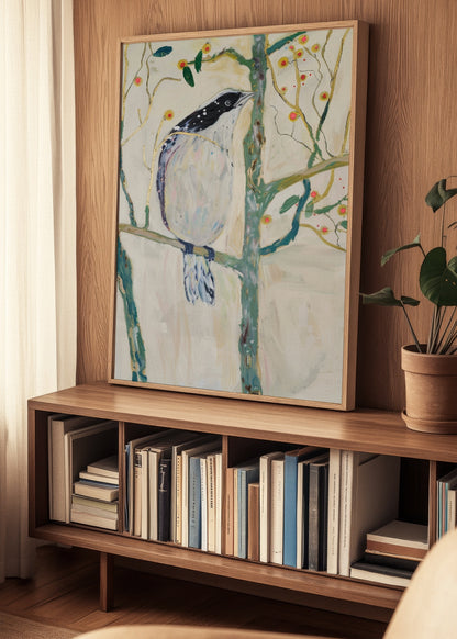 Framed Bird no. 3 poster displayed on a wooden bookshelf in a cozy Nordic living room setting