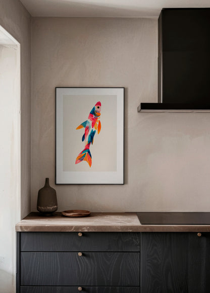 Colorfin fish poster from Hello Poster in a modern Scandinavian kitchen with warm beige walls, dark cabinets and a minimalist styled countertop.