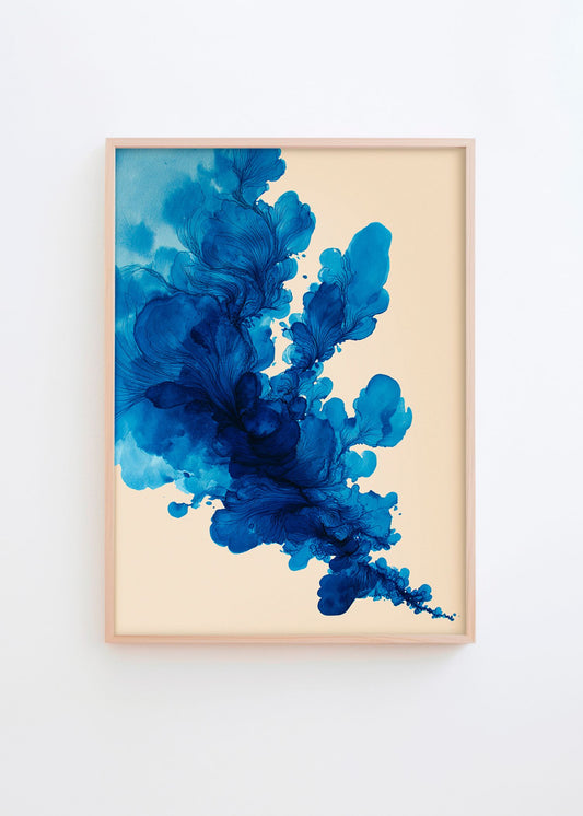 Deep Blue Something abstract poster in a natural oak frame featuring flowing cobalt and navy blue organic ink forms on a warm ivory background, styled on a white wall in a bright Scandinavian interior by Hello Poster