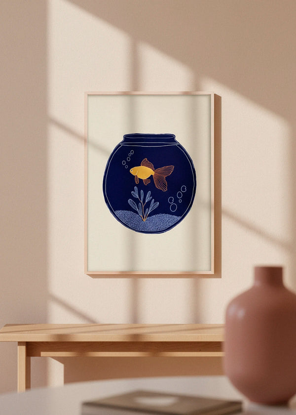 Illustration of a small goldfish in a navy blue fishbowl, framed in light wood, hanging on a beige wall with soft afternoon sunlight casting warm shadows.