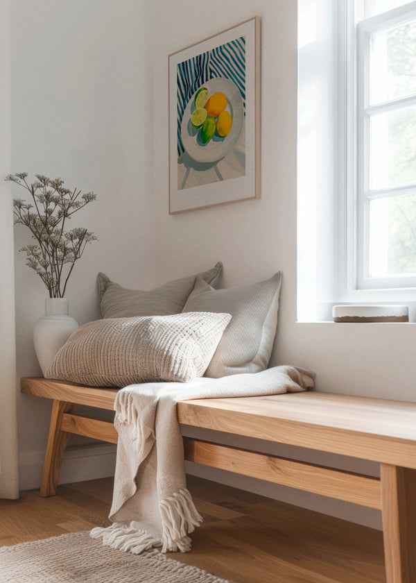 Lemon And Lime art print by Hello Poster styled in a bright Scandinavian interior above a wooden bench with soft textiles and natural light.