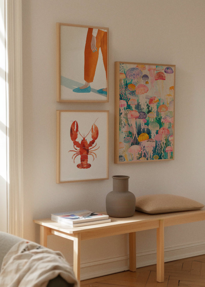 Moody Nails, Lobster & Under Water – Playful Poster Wall
Bright and colorful poster wall with a close-up of a woman’s feet in orange pants ("Moody Nails"), a bold red watercolor lobster ("Lobster"), and a dreamy underwater scene of colorful jellyfish ("Under Water").