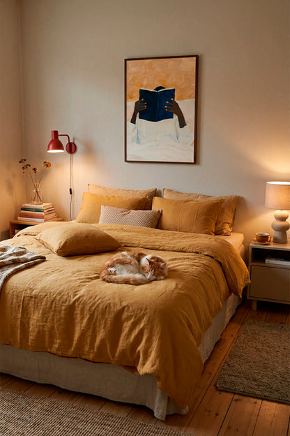 Bedroom with large Must Read poster above the bed creating a warm and cozy mood