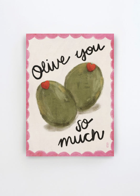 Olive You So Much by Dirkie Nell art print featuring two painterly green olives with small red hearts, playful black hand lettering and a decorative pink border on a soft cream background.