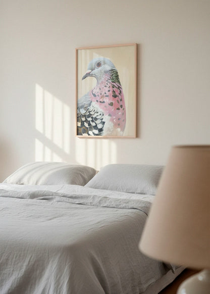 The Pigeon poster hanging in a calm bedroom environment with gentle morning light on a white wall.