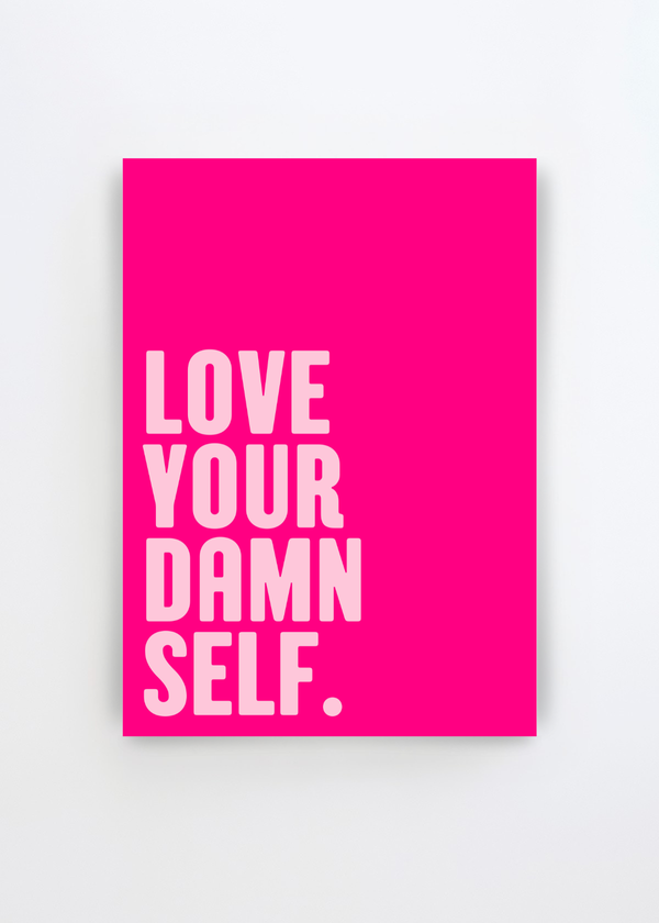Self-Love Boldly by Athene Fritsch typographic art print featuring the phrase “Love Your Damn Self.” in oversized pale pink lettering on a vivid hot pink background.