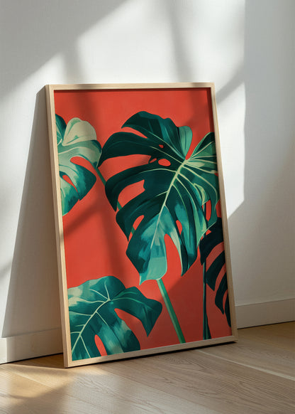 Framed Monstera poster resting on floor with sunlight and shadow play